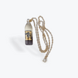 Laden Sie das Bild in den Galerie-Viewer, SLUM GOLD GLASS 40 OZ BOTTLE PENDANT W/ GOLD CHAIN
